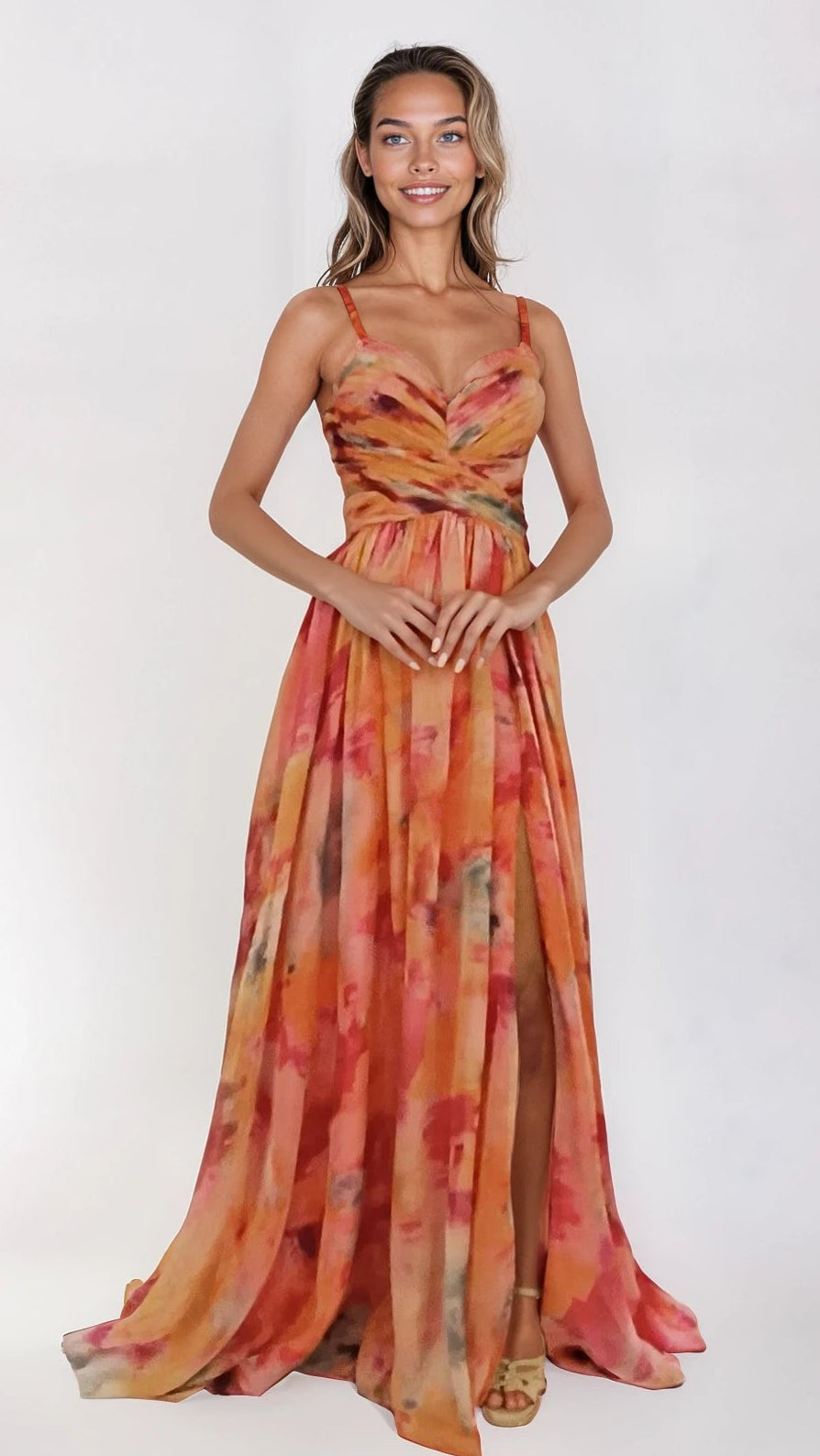 Woman wearing a colorful dress with a white background